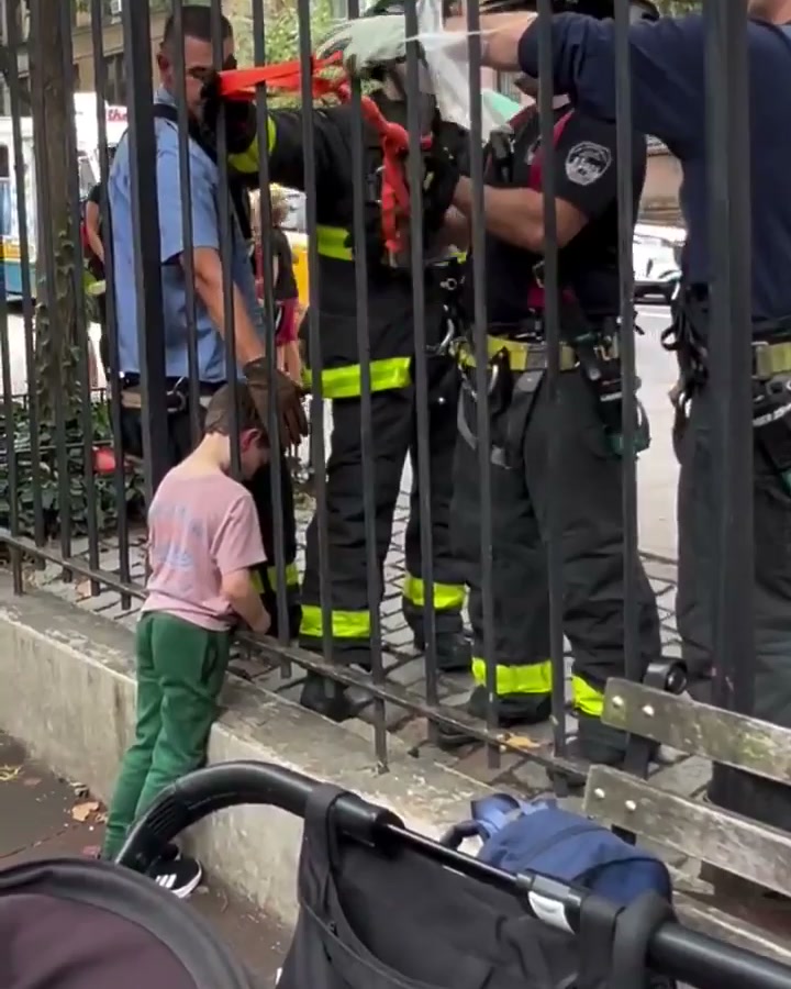 Firefighters spread the bars with a hydraulic tool