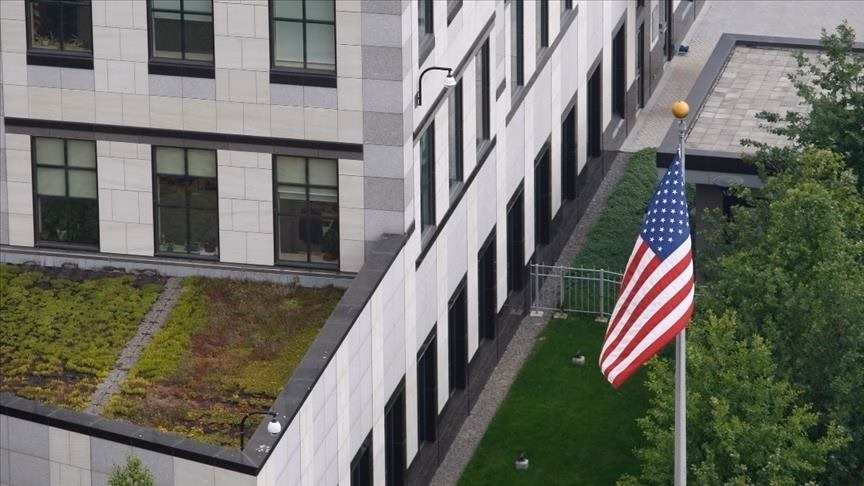 U.S. Embassy building with the American flag (AA)