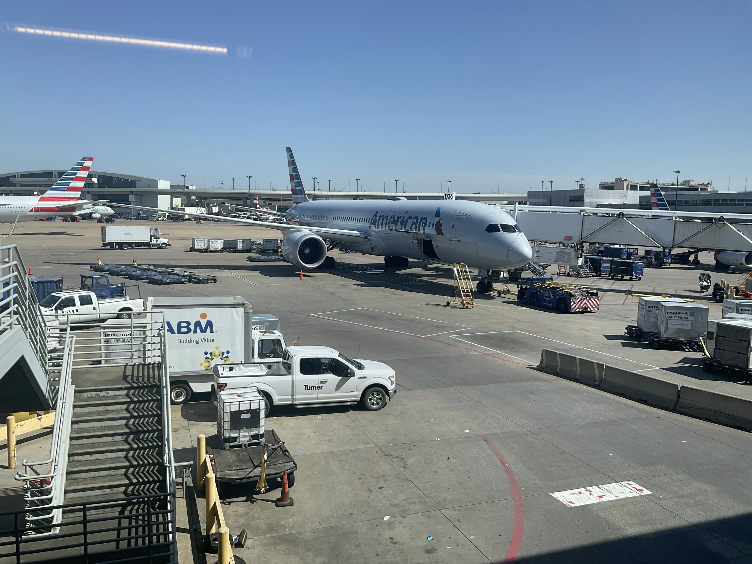 An American Airlines Boeing 787 at an airport gate