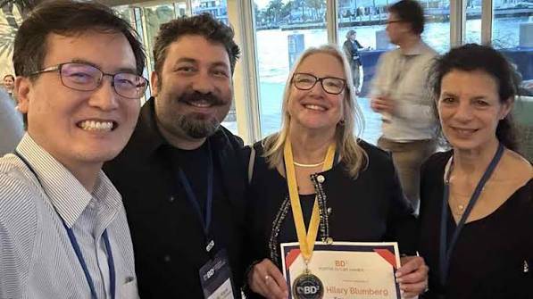 Dr. Kutlu Kaya (second from left) with Prof. Hilary Blumberg (second from right) and colleagues at the ISBD conference