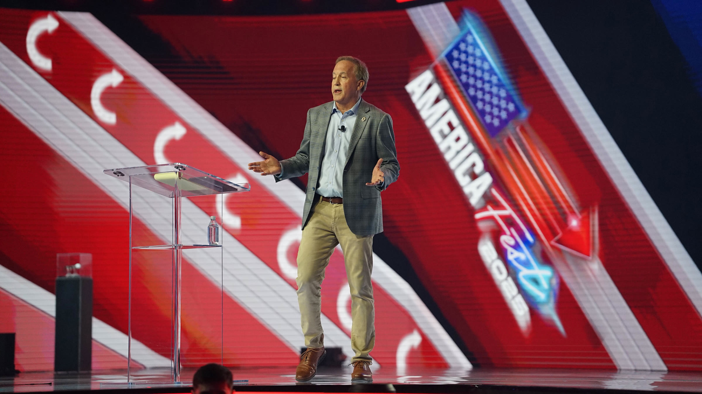 Texas Attorney General Ken Paxton speaks at AmericaFest in December 2025