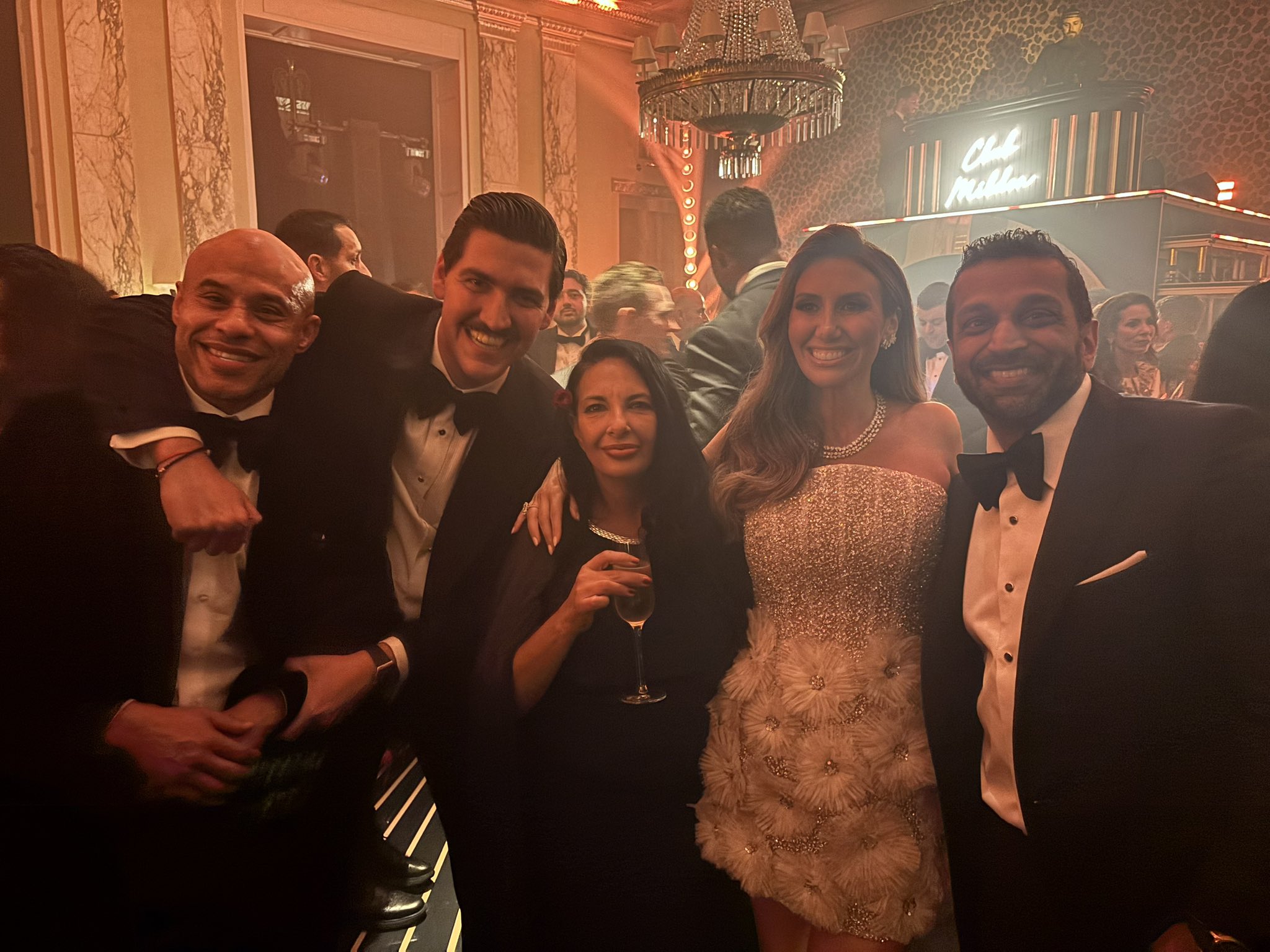 Alina Habba with guests at the afterparty
