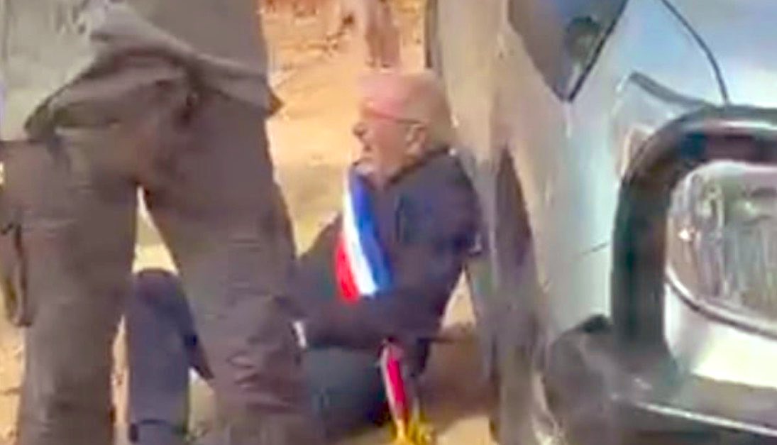 French mayor Bernard Baudoux on the ground after the attack (video still)