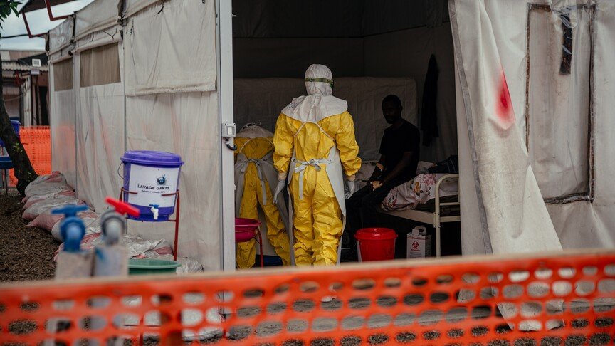 A health worker in protective gear at an Ebola treatment center
