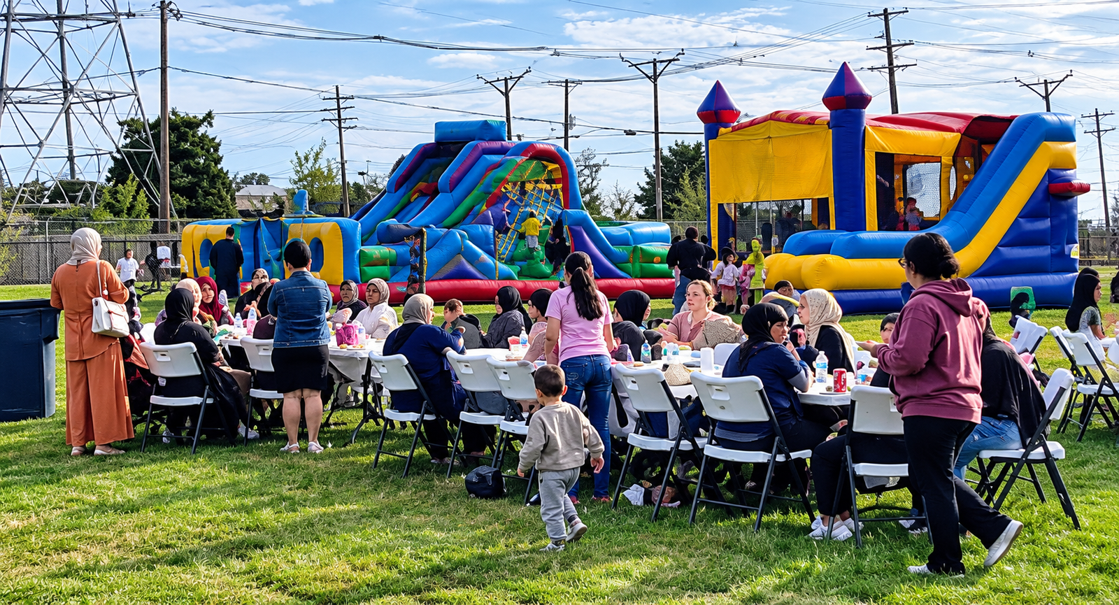 Inflatable play areas set up for children at the festival