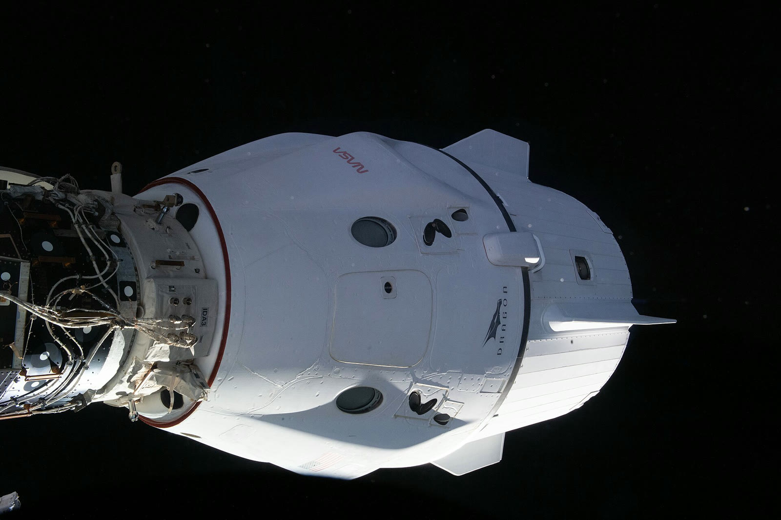 A Crew Dragon capsule docked with the International Space Station (archive)