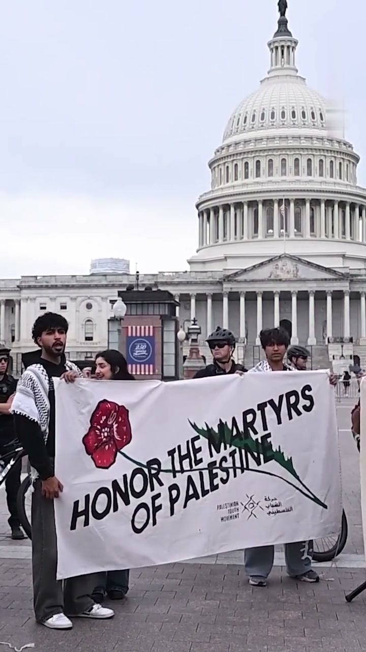 A banner reading “Honor the martyrs of Palestine”