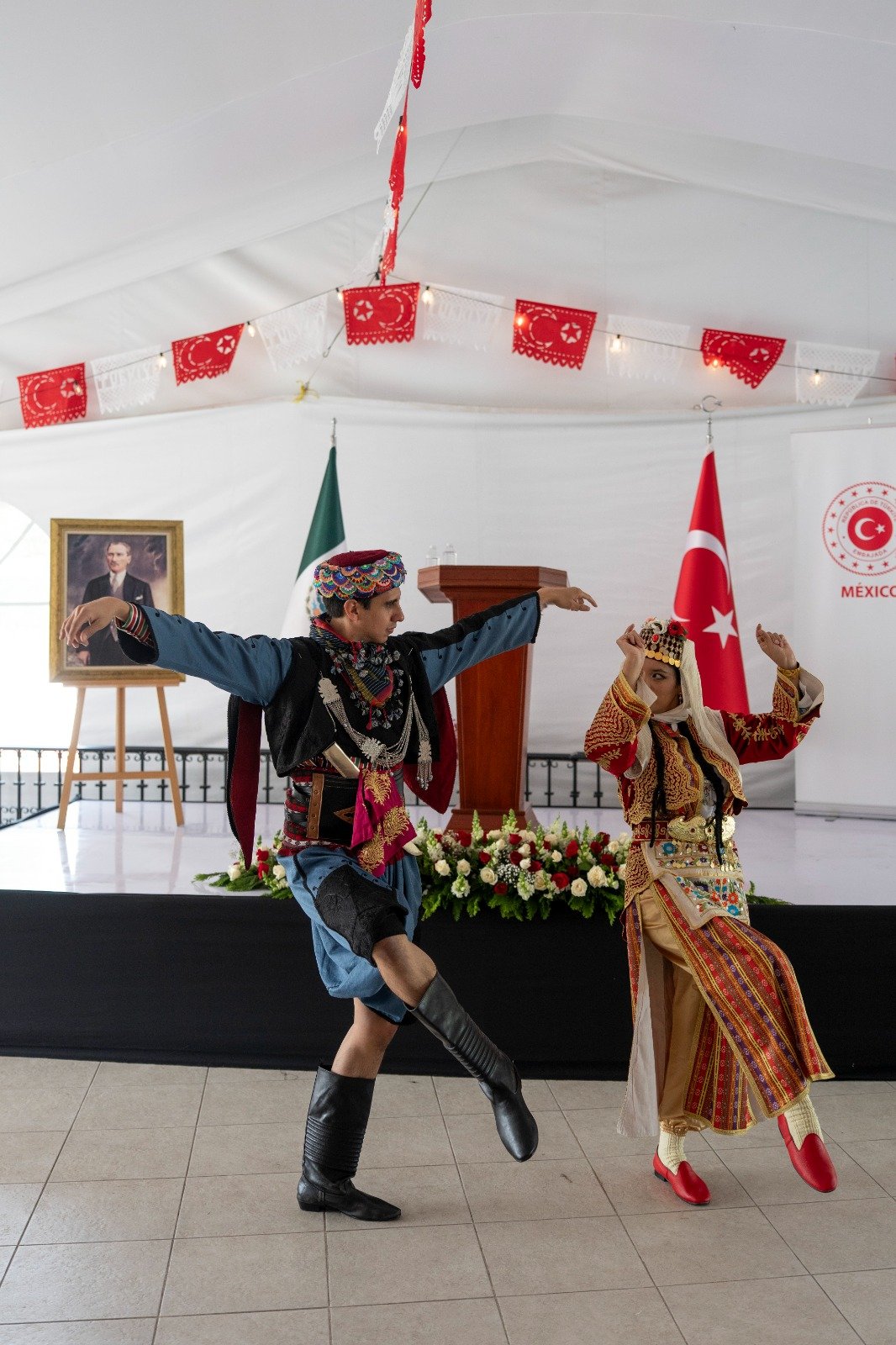 Dancers in traditional costume perform a Turkish folk dance at the reception