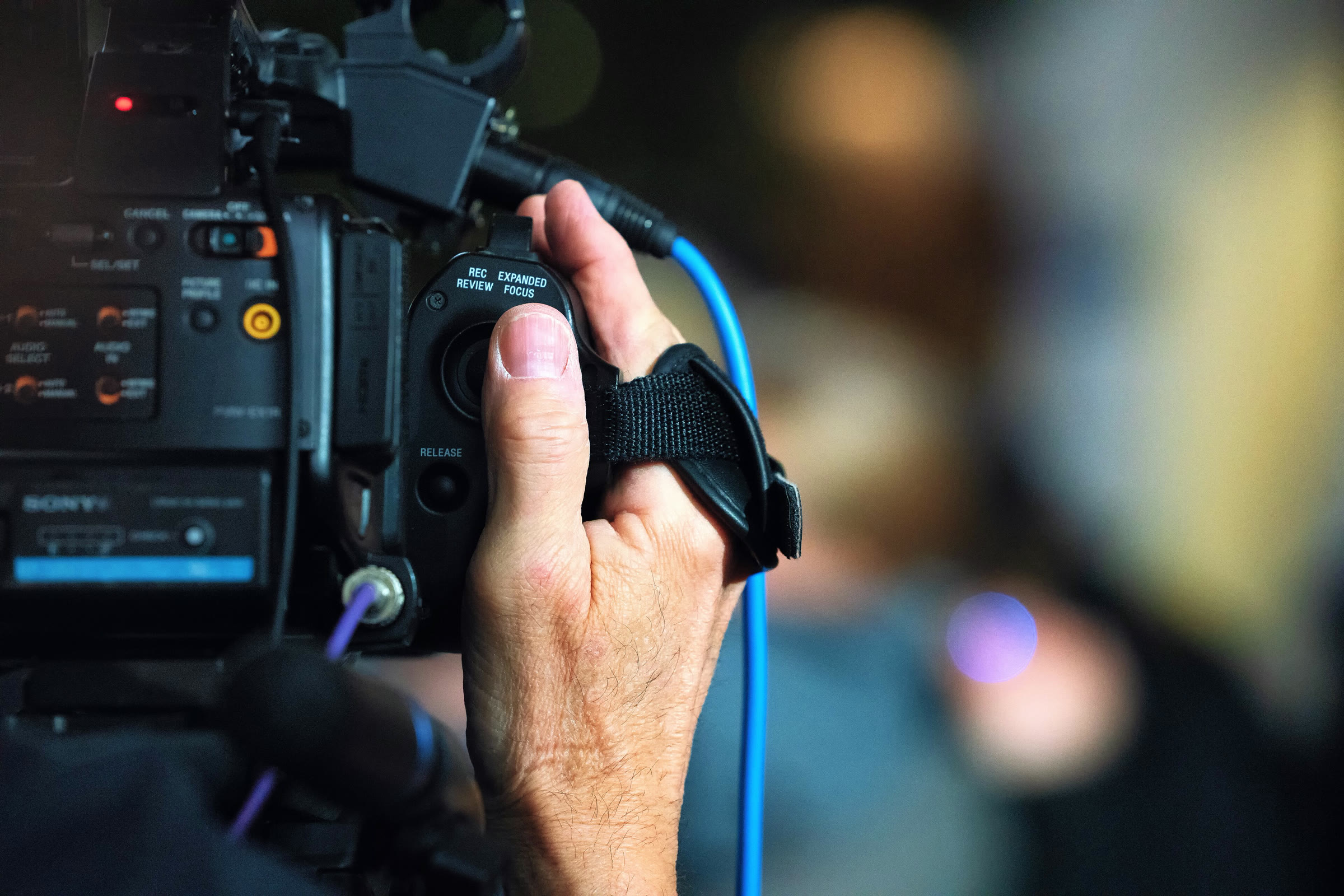 A news camera operator (illustrative)
